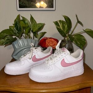Nike White Low-Top Sneakers with Pink Swoosh
